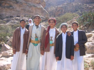 Boys on a mountainside in Yemen.